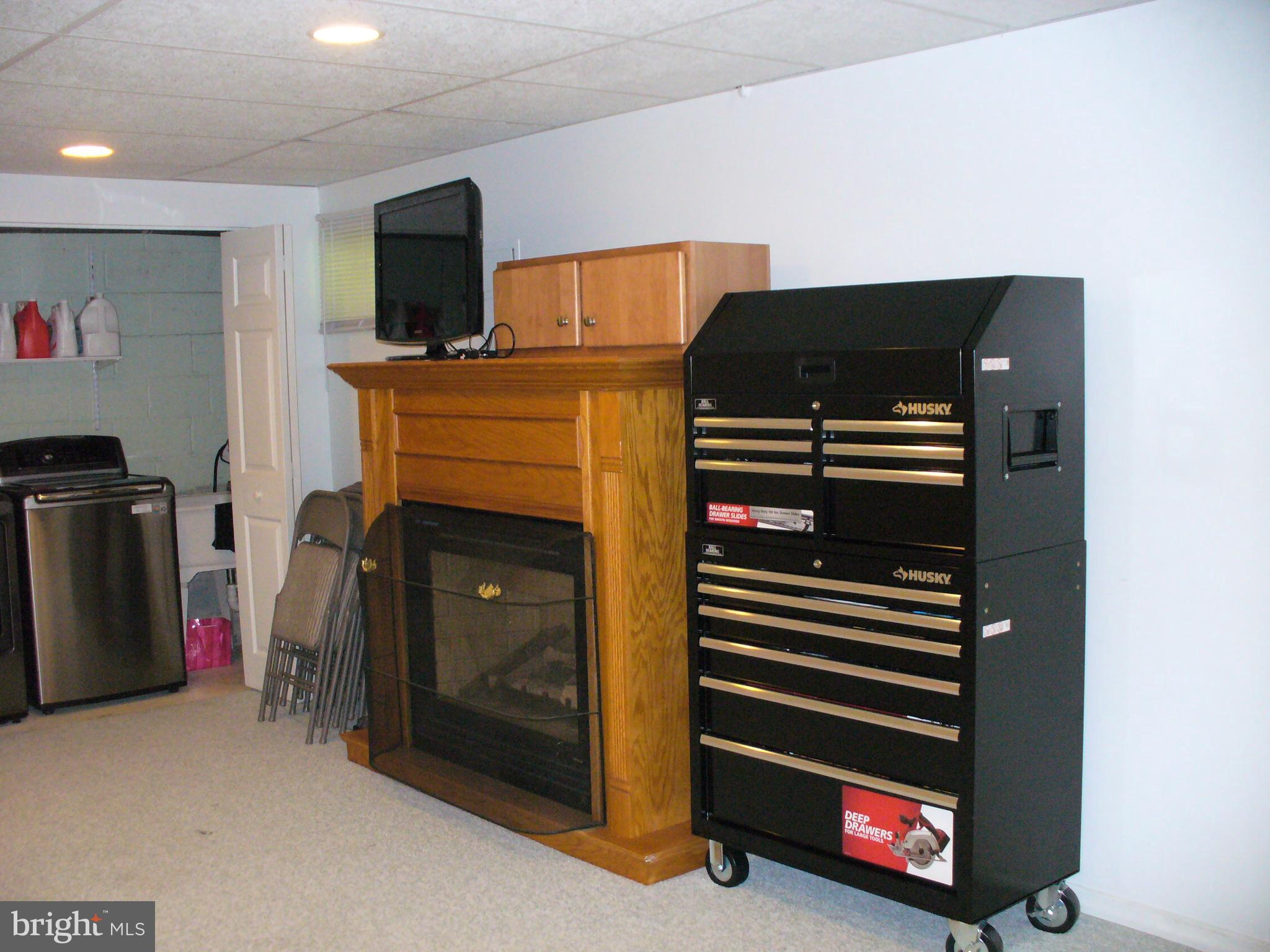 3424 Falling Green Road Olney, MD 20832 - Photo 41 of 47 Basement rec room fireplace