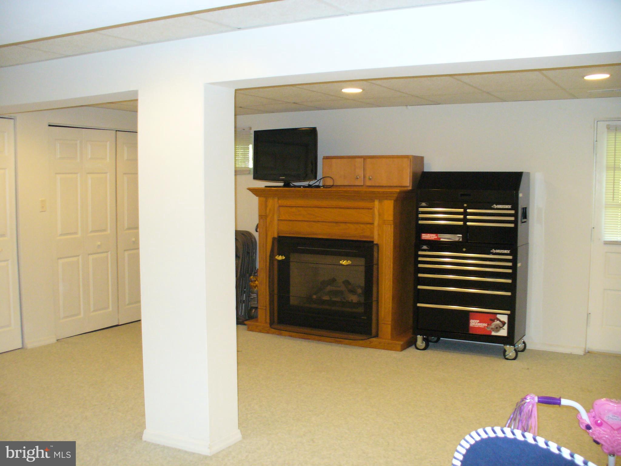 3424 Falling Green Road Olney, MD 20832 - Photo 46 of 47 Basement fireplace