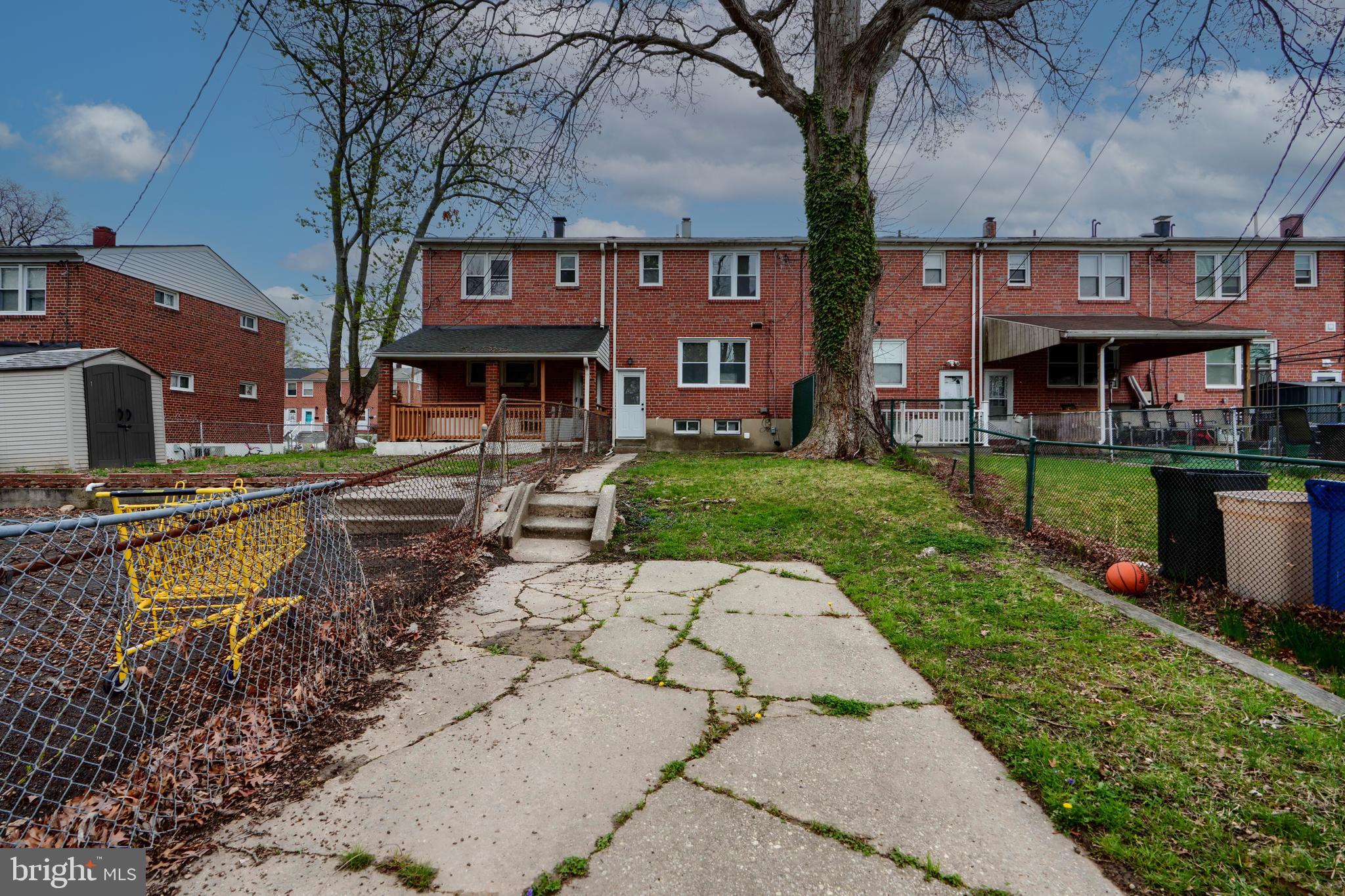 1632 Riverwood Road Baltimore, MD 21221 - Photo 25 of 32 a front view of a building with garden