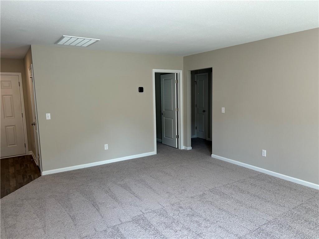 31 Whiterock Road Phenix City, AL 36869 - Photo 19 of 36 Unfurnished room with baseboards and carpet