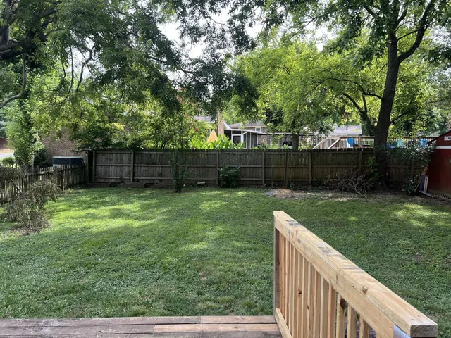 a view of a backyard with a garden