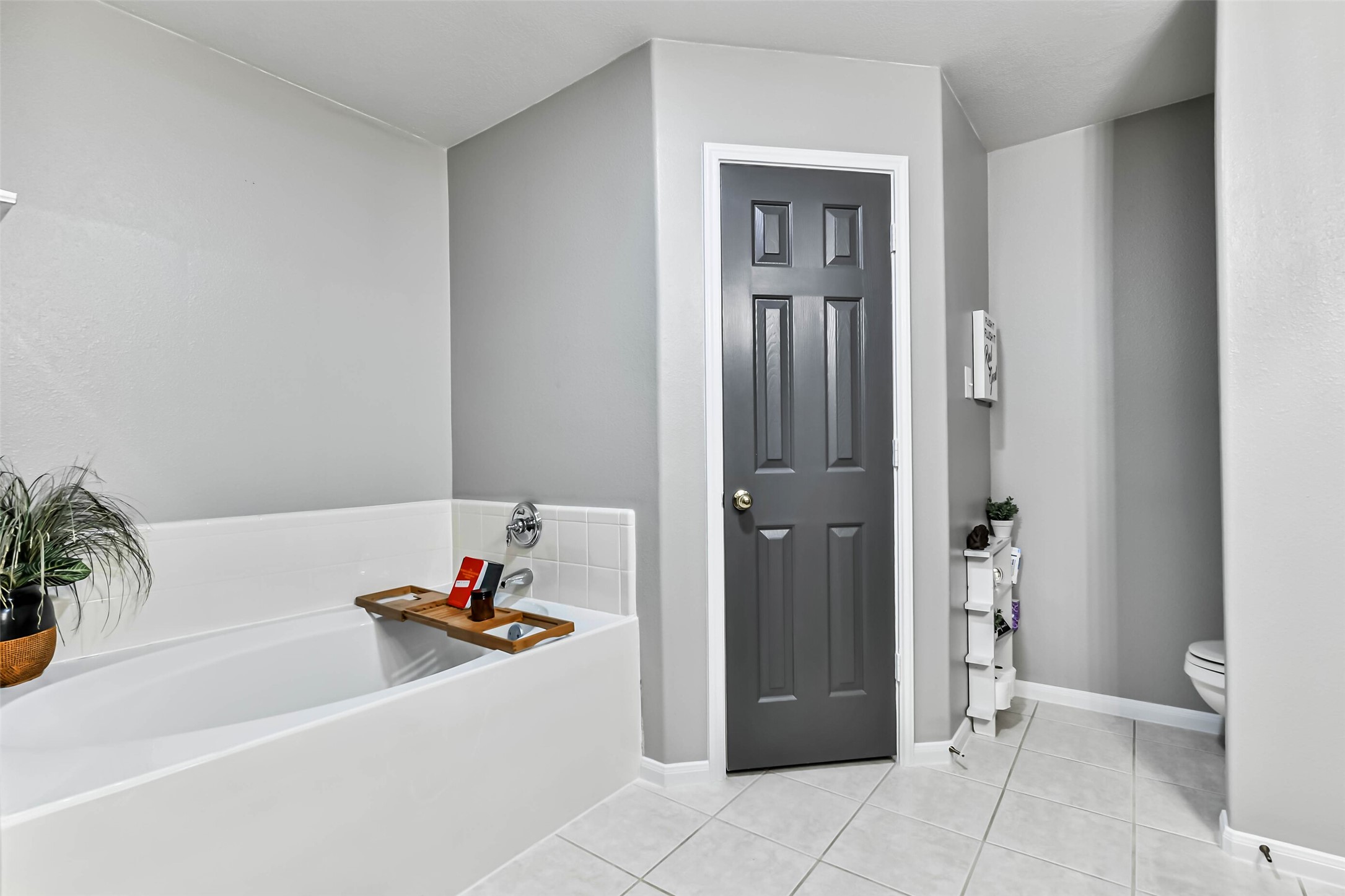 5114 Spring Oak Drive Pasadena, TX 77505 - Photo 19 of 25 a bathroom with a tub shower and a sink