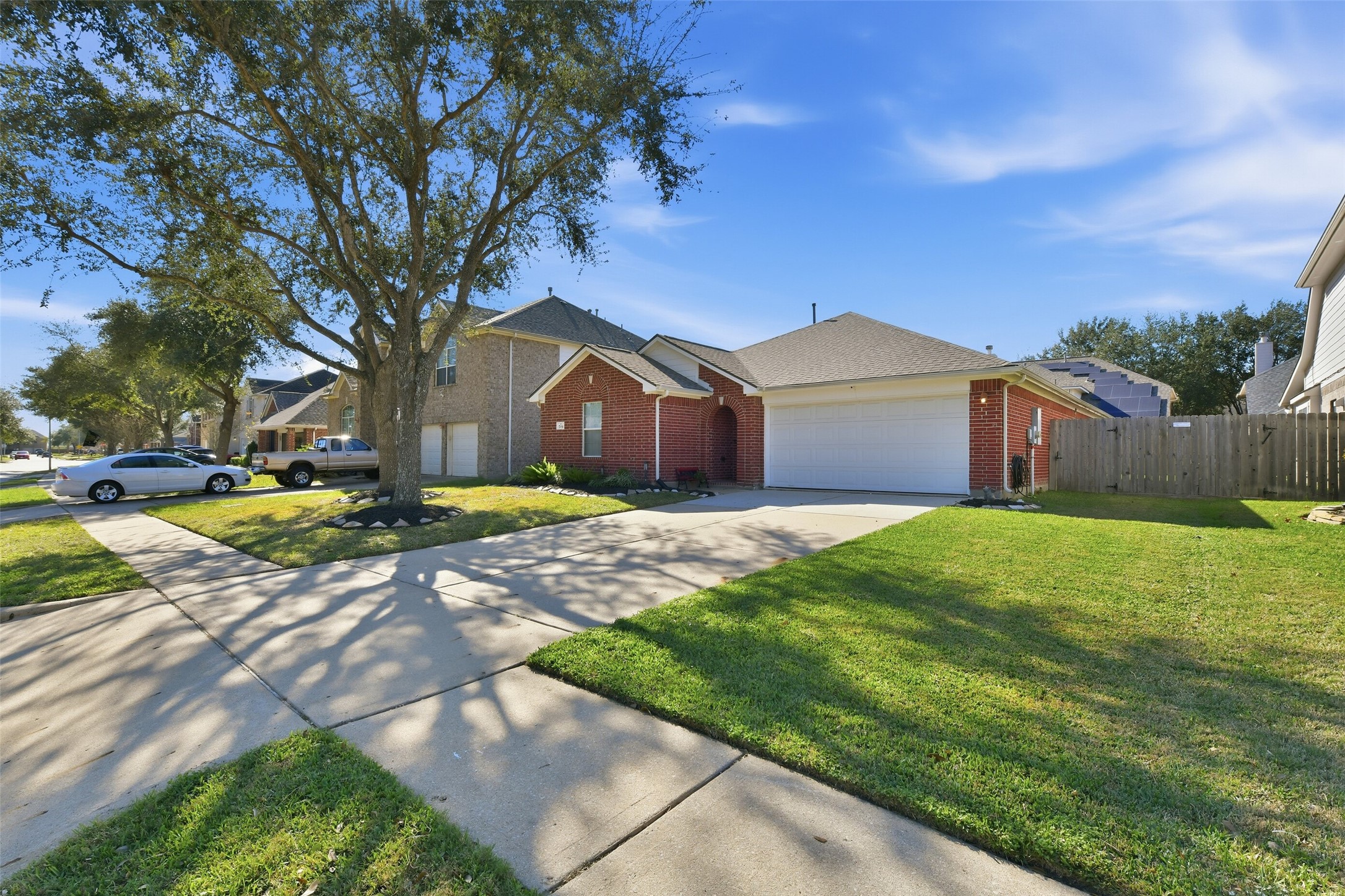 5114 Spring Oak Drive Pasadena, TX 77505 - Photo 2 of 25 a house view with a garden space