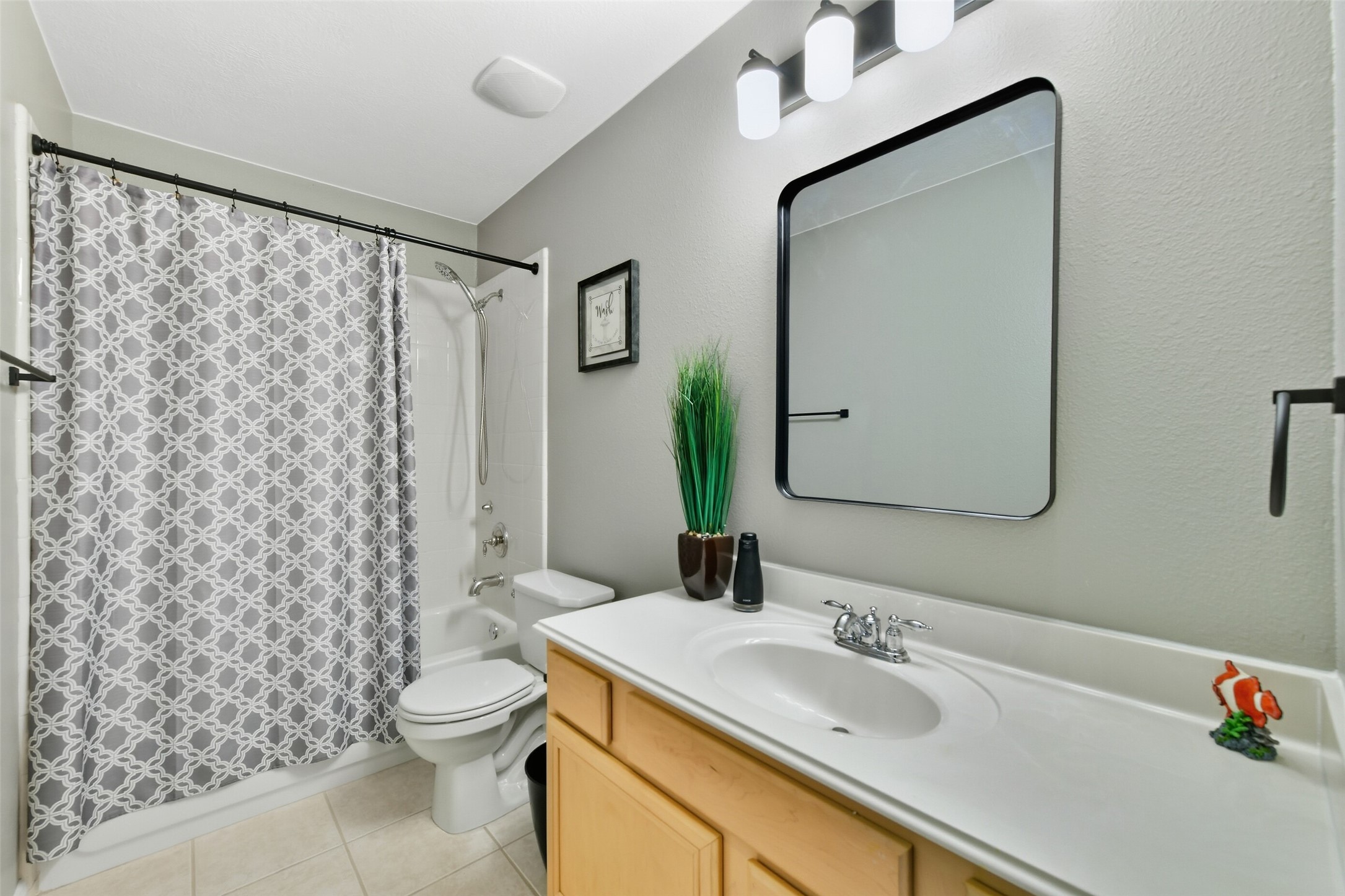 5114 Spring Oak Drive Pasadena, TX 77505 - Photo 21 of 25 a bathroom with a sink toilet and shower