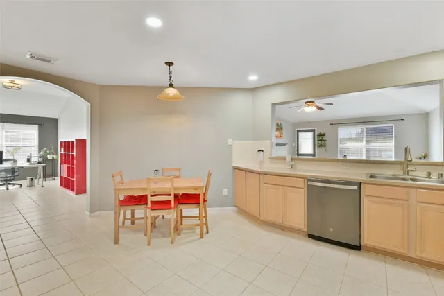 a kitchen with stainless steel appliances a sink and counter space