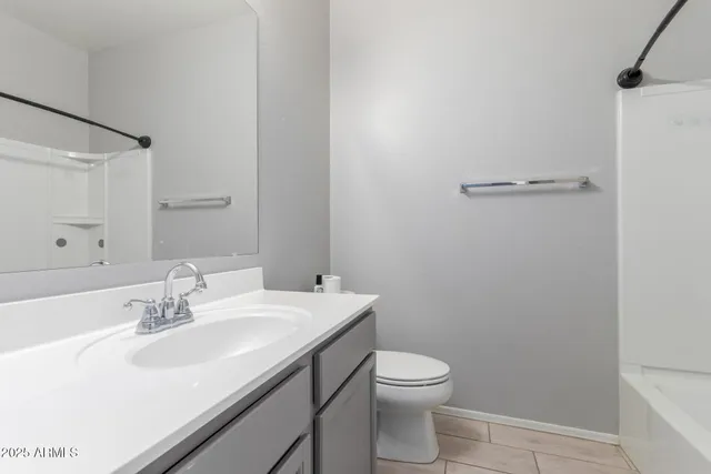 a view of a backyard with a garden and plants