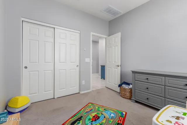 a room with a bed and a window