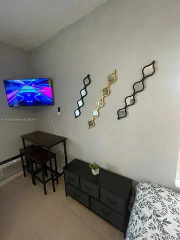 a living room with furniture and rug