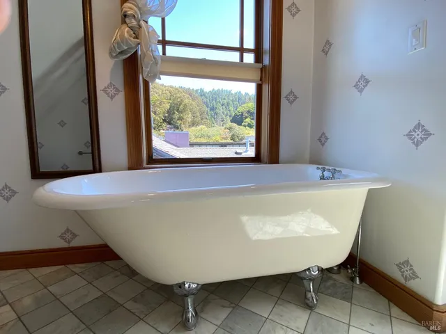 a view of a bathtub in a bathroom