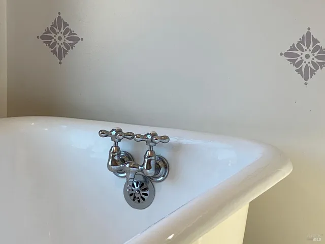 a bathroom with a shower and toilet