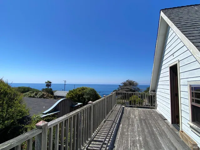 a balcony with an outdoor space