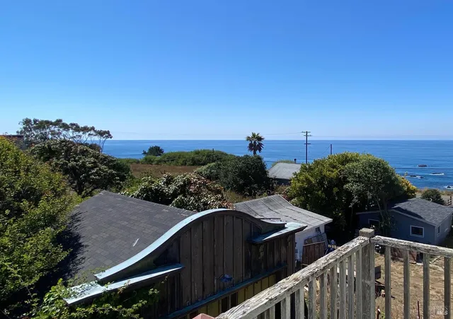 a view of a kitchen with cabinets