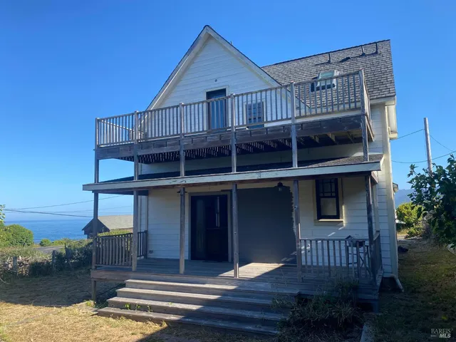 front view of a house with a balcony