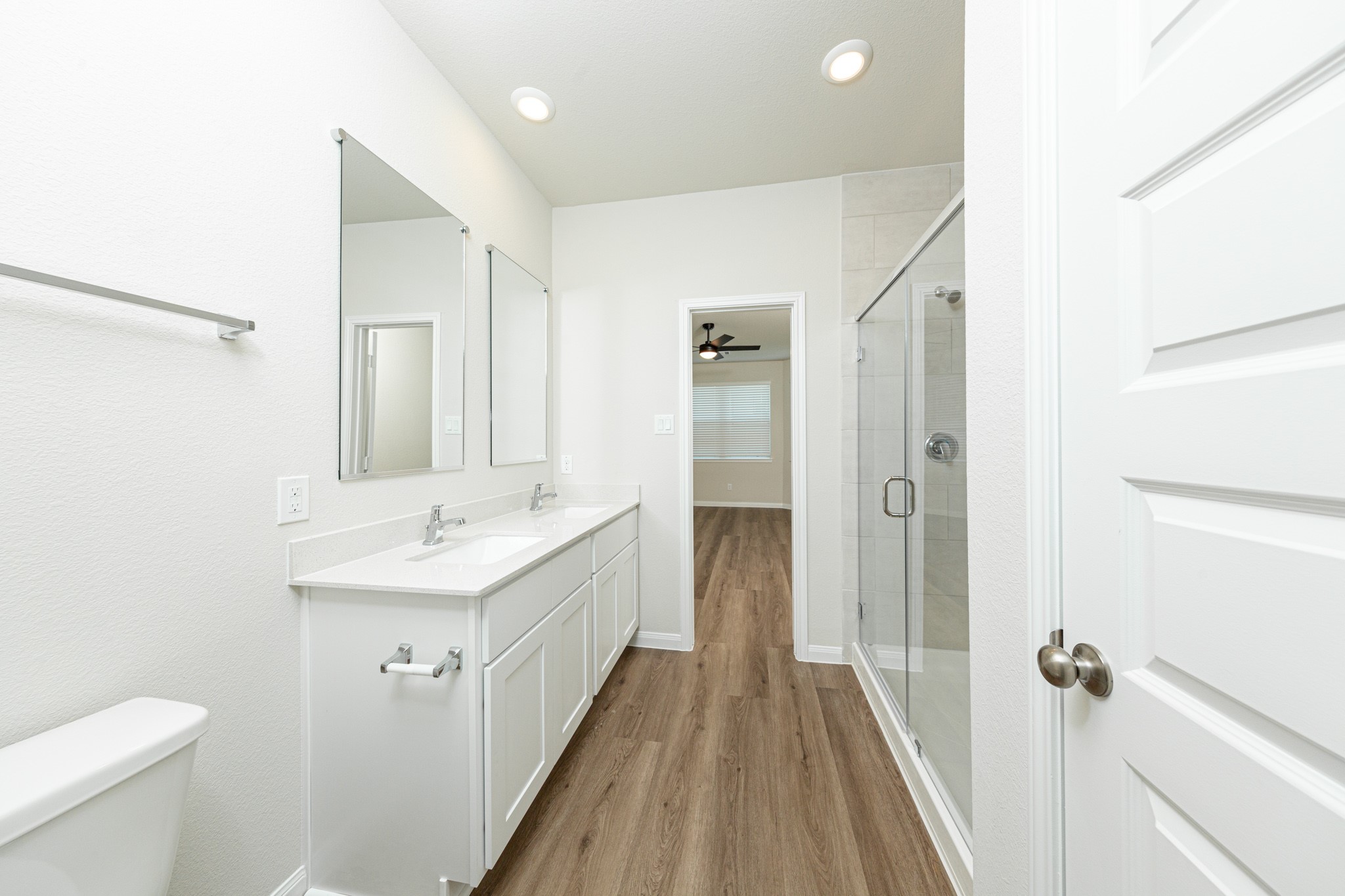 13651 Kit Run Splendora, TX 77372 - Photo 10 of 27 a bathroom with a sink a toilet a mirror and shower
