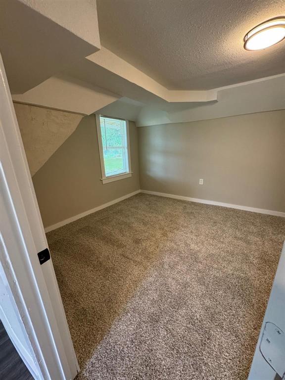 1201 North Rusk Street Weatherford, TX 76086 - Photo 23 of 32 an empty room with windows