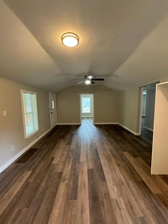 1201 North Rusk Street Weatherford, TX 76086 - Photo 29 of 32 a view of empty room with wooden floor