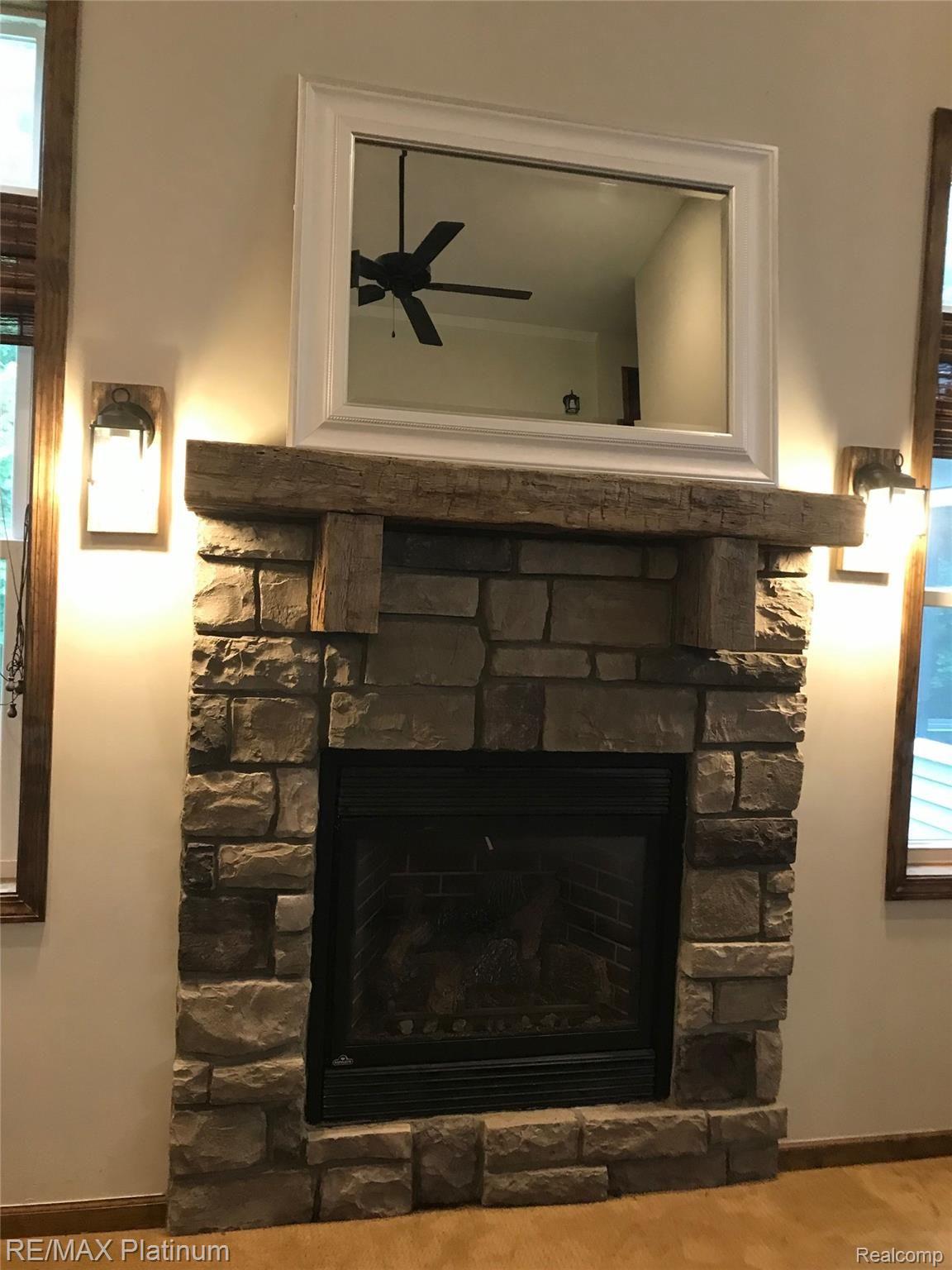 140 Inverness Street Howell, MI 48843 - Photo 13 of 34 CUSTOM STONE FIREPLACE
