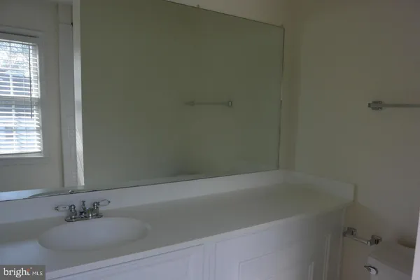 a bathroom with a sink and a bathtub