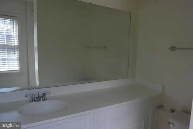 a bathroom with a sink and a bathtub