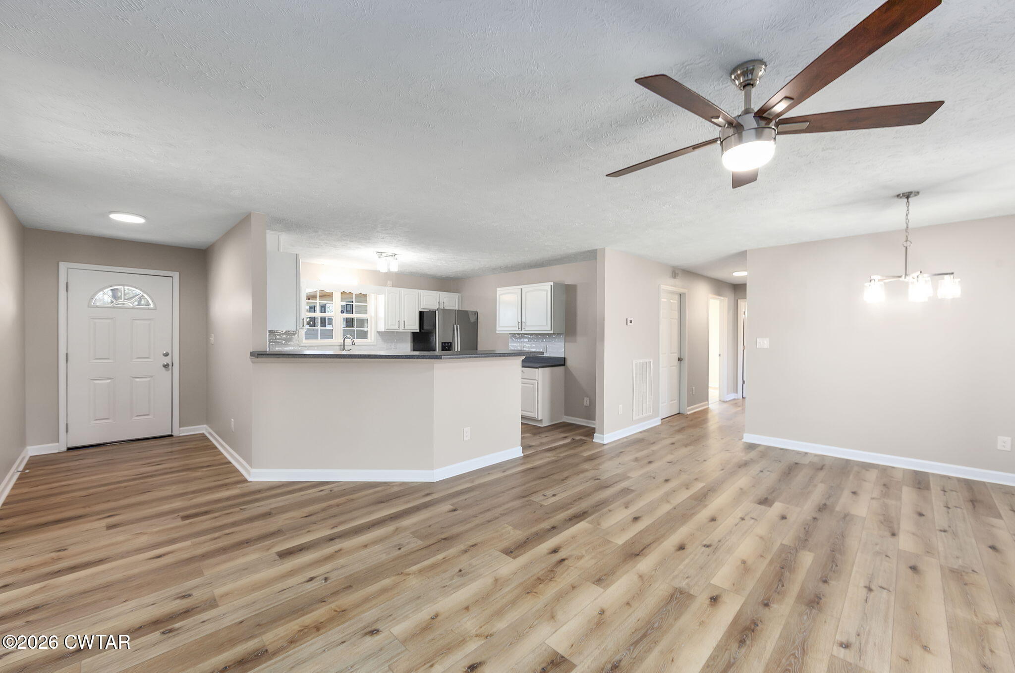 2265 Bond Ferry Road Brownsville, TN 38012 - Photo 22 of 26 a view of a kitchen with a sink and cabinet with a dishwasher