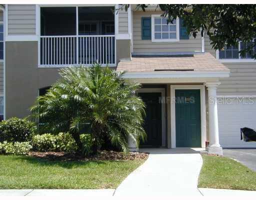 8926 Manor Loop, Unit 102 Lakewood Ranch, FL 34202 - Photo 1 of 1 Exterior Front - GREAT FIRST FLOOR LOCATION! WALK RIGHT IN FROM YOUR ATTACHED GARAGE.