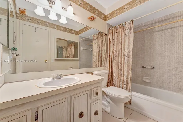 a view of a street with cars