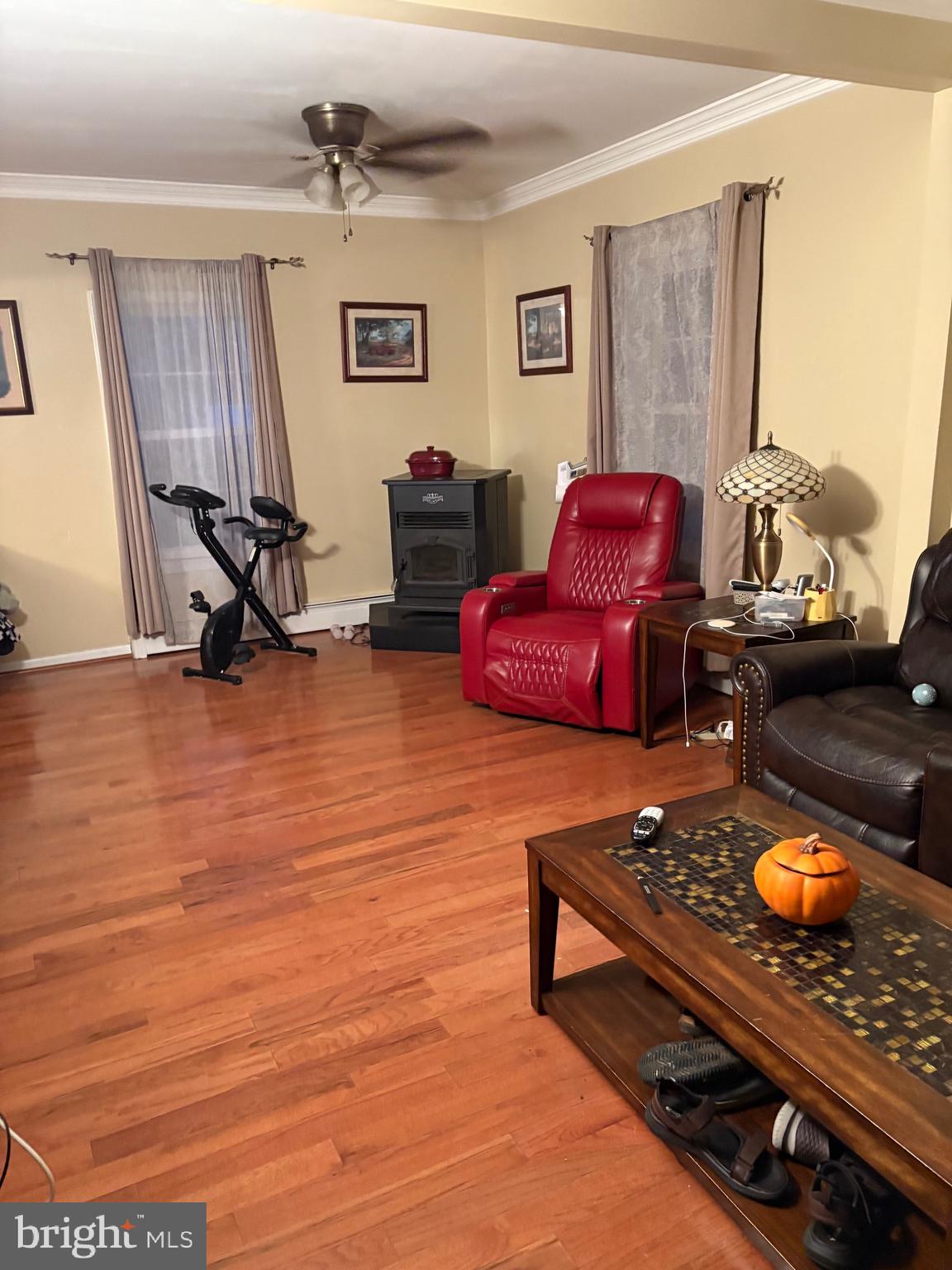 26669 Queentree Road Mechanicsville, MD 20659 - Photo 11 of 48 a living room with furniture and a flat screen tv