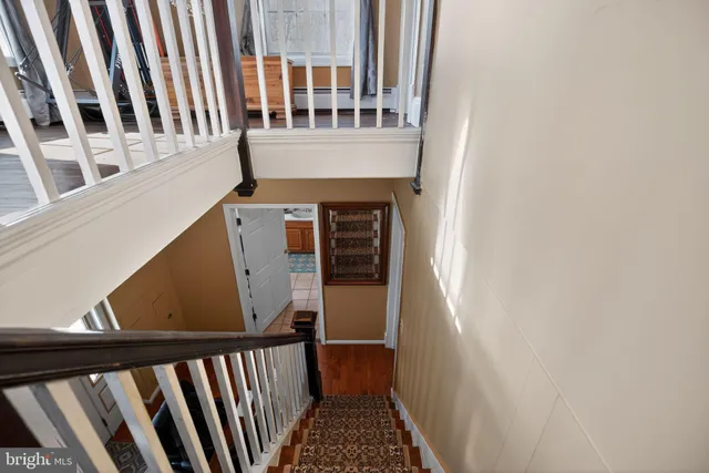 a view of entryway with stairs