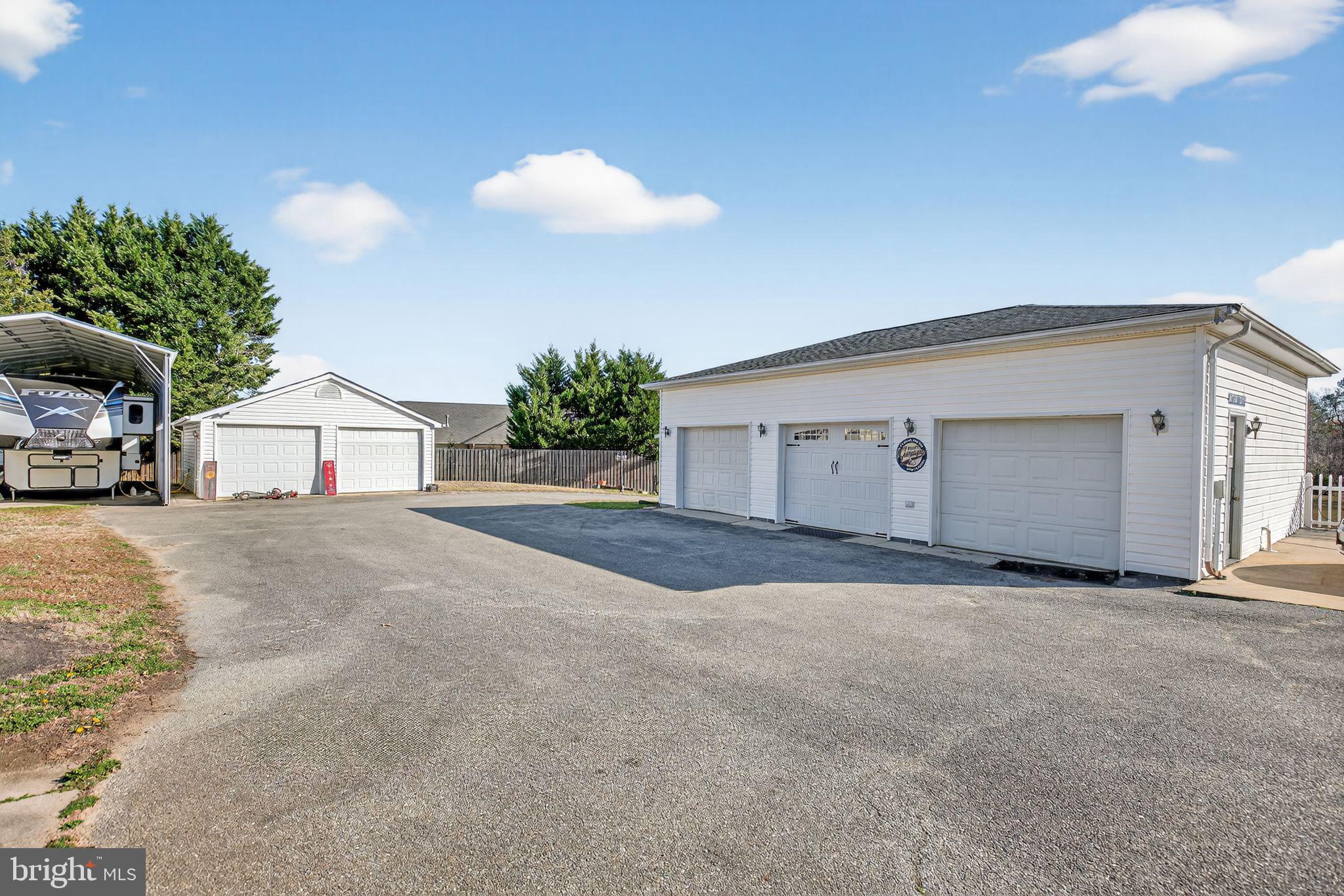 26669 Queentree Road Mechanicsville, MD 20659 - Photo 25 of 48 a view of large house with a street