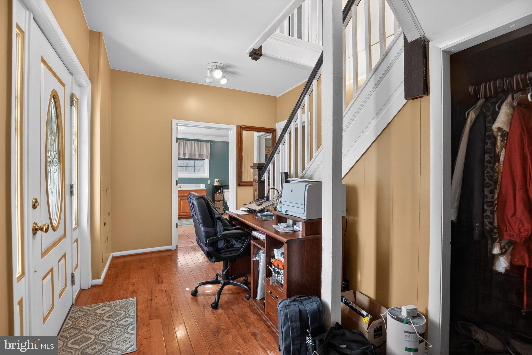 26669 Queentree Road Mechanicsville, MD 20659 - Photo 32 of 48 a view of a livingroom with furniture and hardwood floor