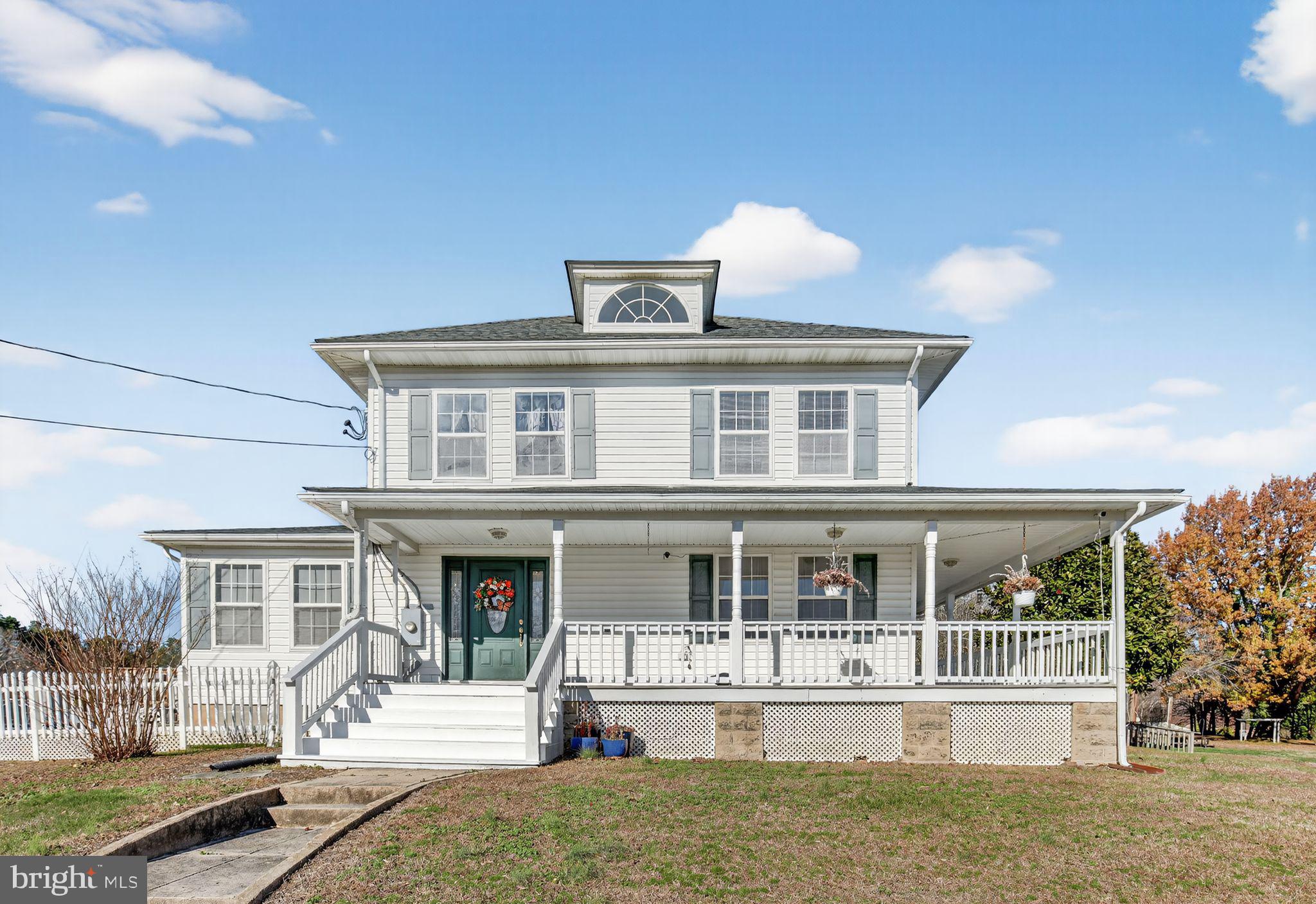 26669 Queentree Road Mechanicsville, MD 20659 - Photo 34 of 48 a front view of a house with a yard