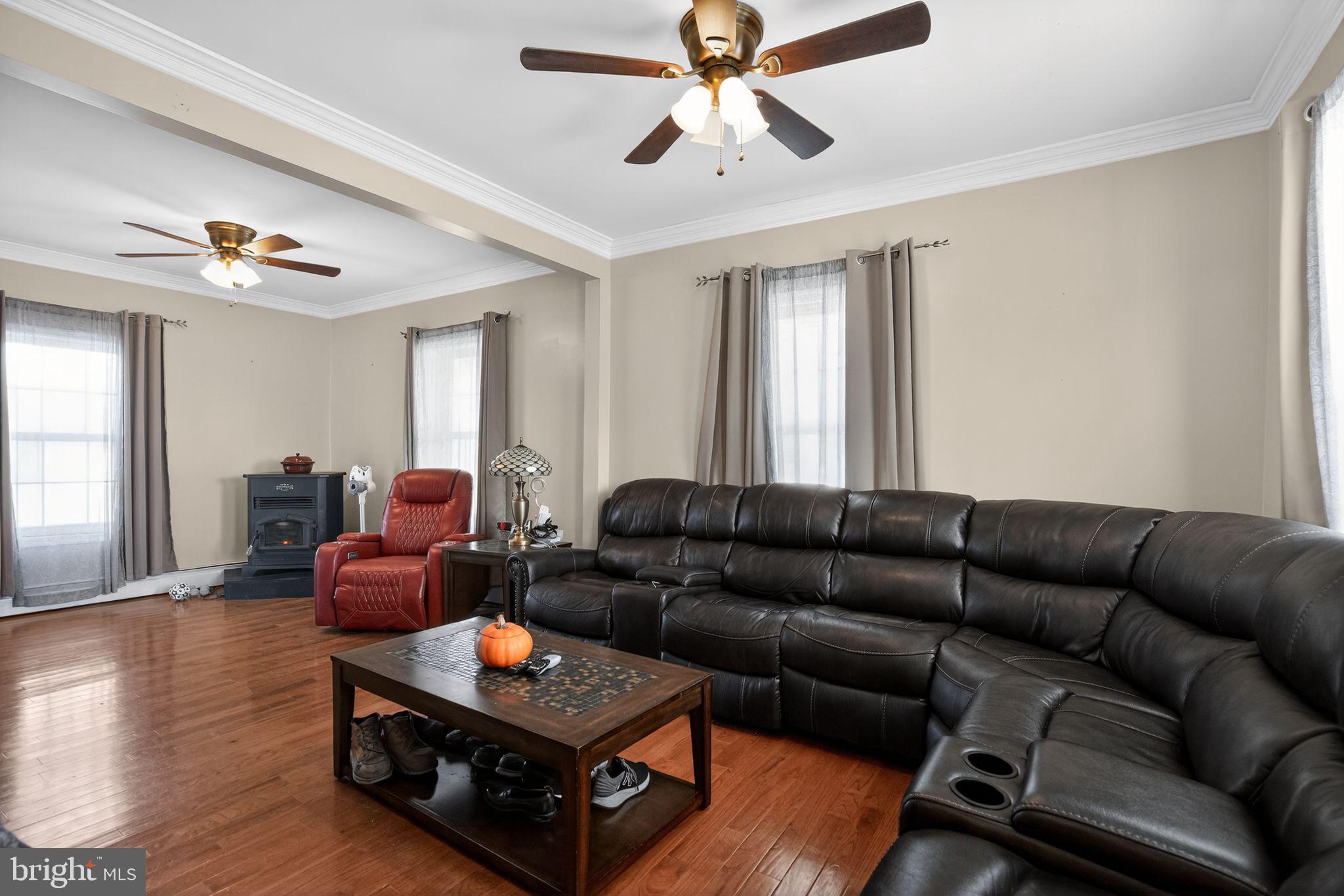 26669 Queentree Road Mechanicsville, MD 20659 - Photo 41 of 48 a living room with furniture and wooden floor