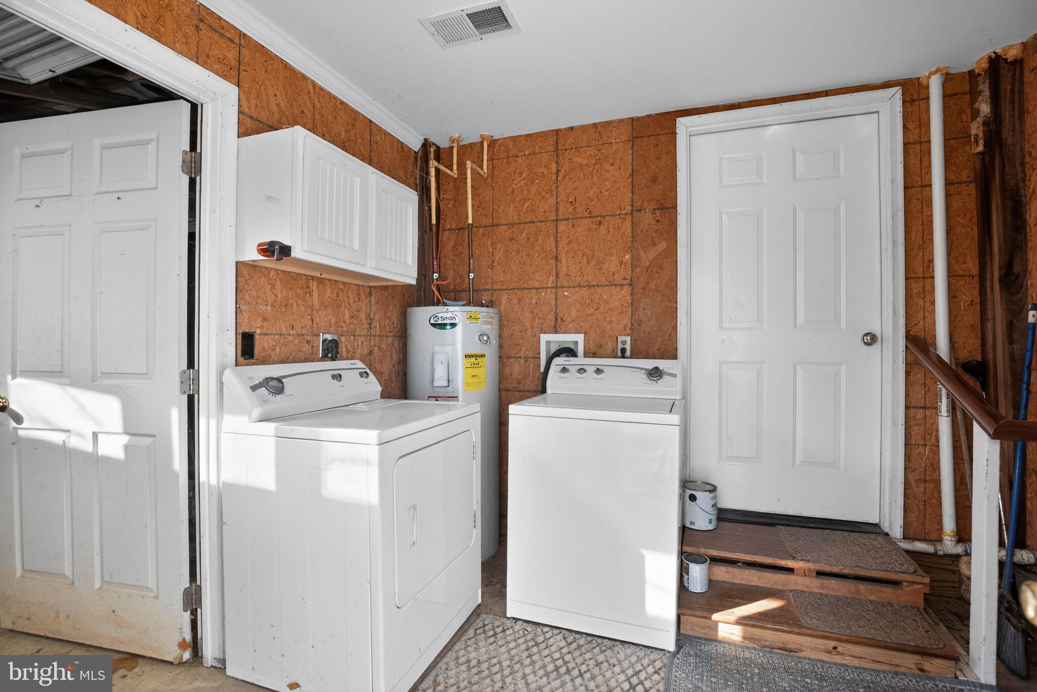 26669 Queentree Road Mechanicsville, MD 20659 - Photo 42 of 48 a utility room with dryer and washer