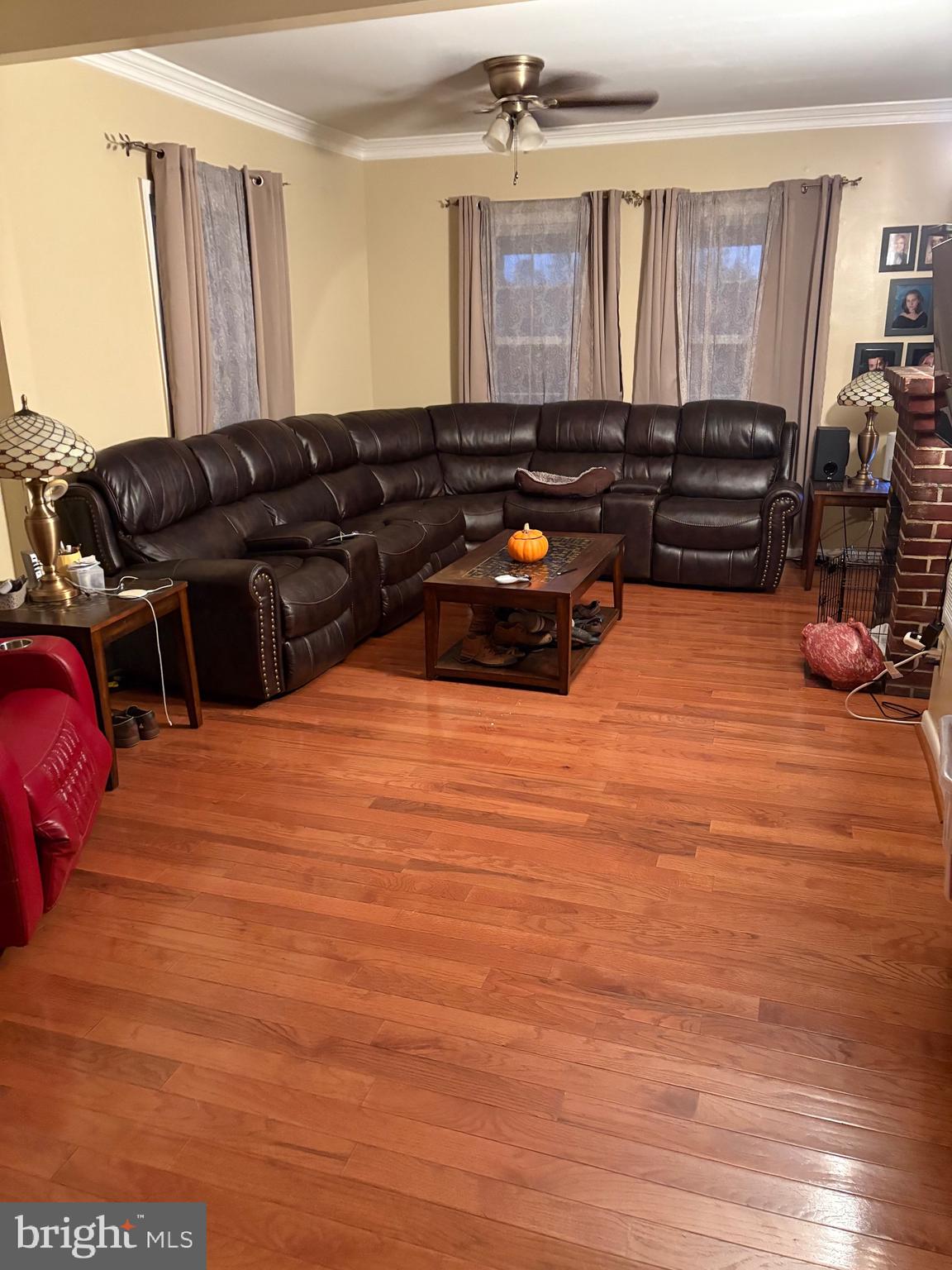 26669 Queentree Road Mechanicsville, MD 20659 - Photo 10 of 48 a living room with furniture and wooden floor