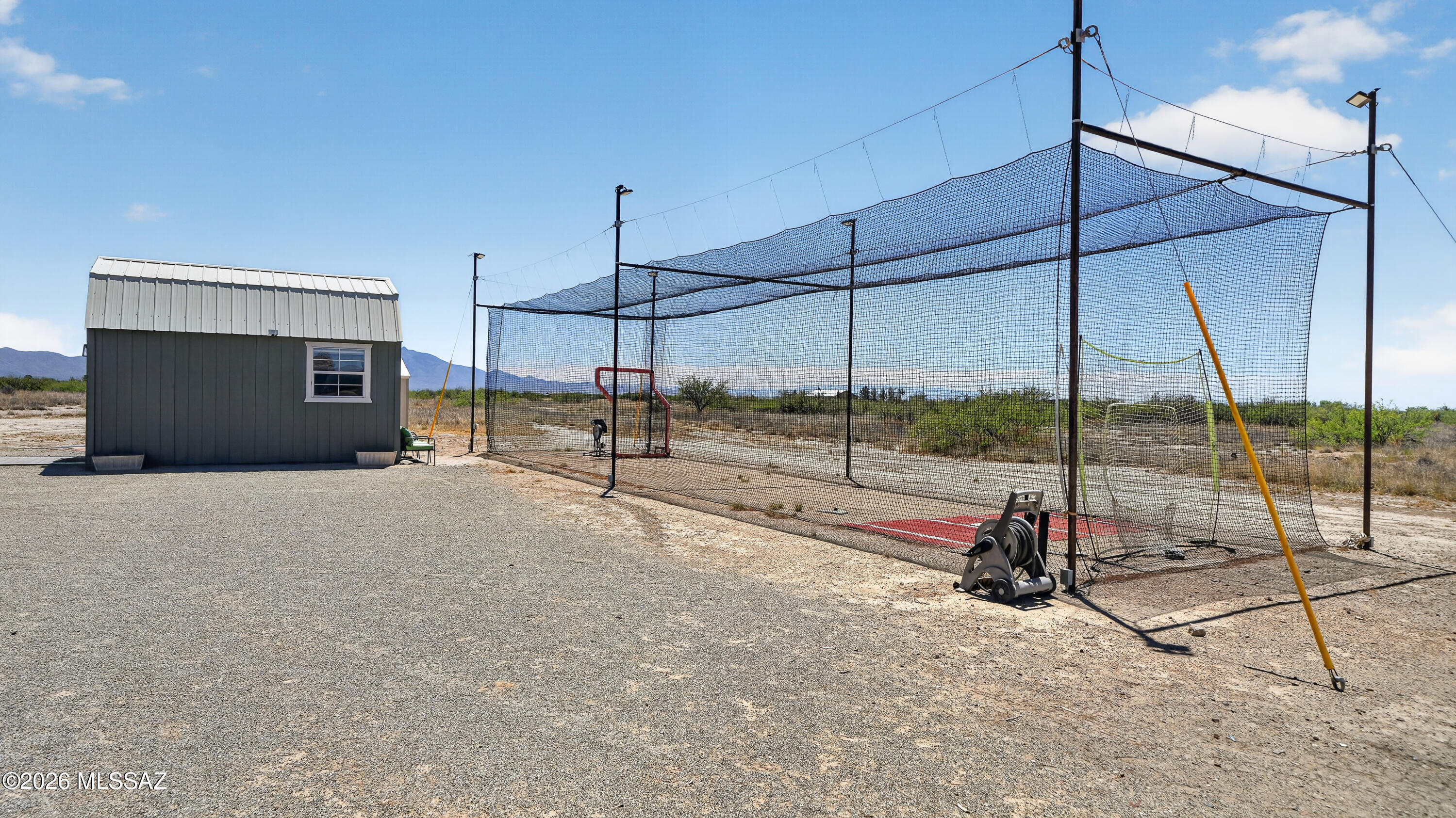 194 Taylor Road Willcox, AZ 85643 - Photo 46 of 54 Outdoor Batting cage 16x55, Steel Metal Frame with 6 LED Lights, water spicket at corner