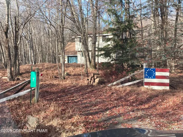 a house view with a backyard space