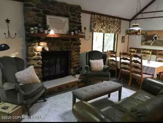 a bedroom with two beds and a window