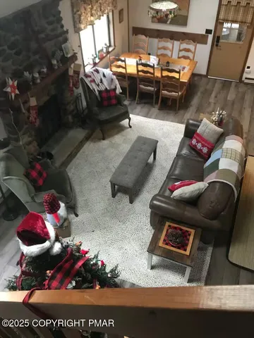 a dining room with furniture and window