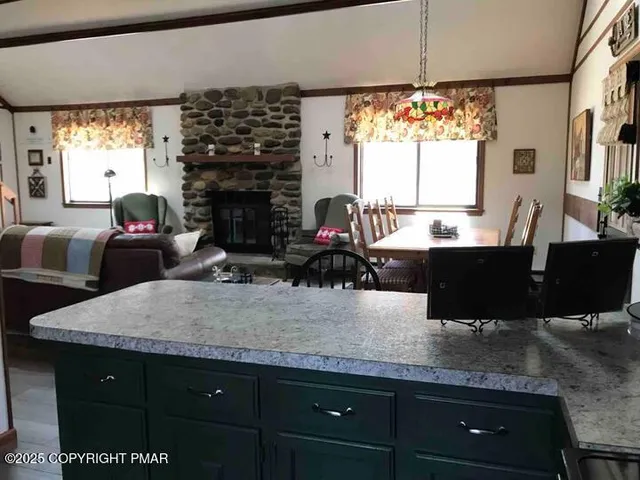 a bedroom with furniture and a chandelier