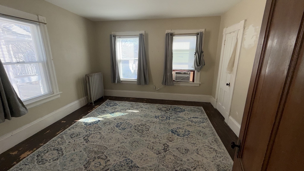 24 Hampden Street West Springfield, MA 01089 - Photo 10 of 18 a view of an empty room and window