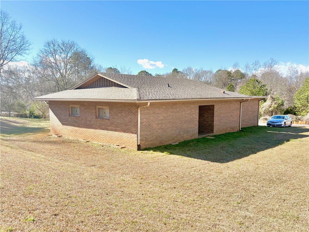 1404 Farrs Bridge Road Easley, SC 29640 - Photo 1 of 27 This brick exterior building offers a functional space with a classic, durable facade.