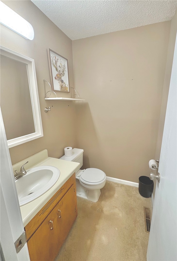 1404 Farrs Bridge Road Easley, SC 29640 - Photo 14 of 27 This cozy bathroom features practical design and efficient use of space.