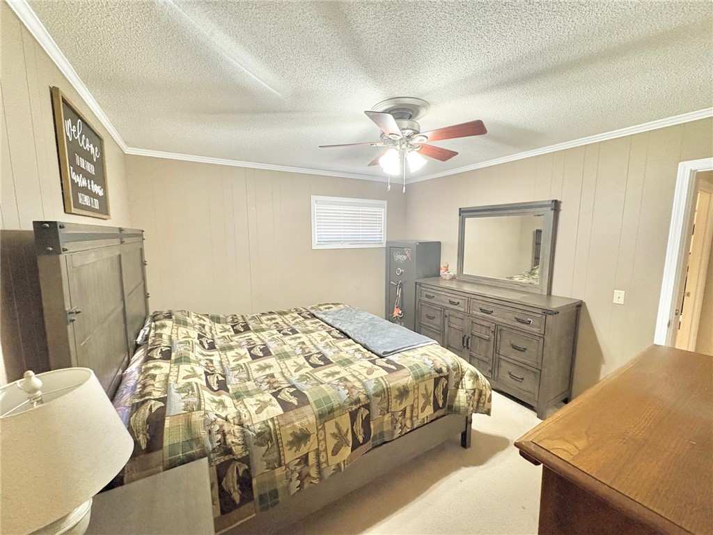 1404 Farrs Bridge Road Easley, SC 29640 - Photo 15 of 27 This cozy bedroom offers a warm and inviting atmosphere perfect for restful nights.