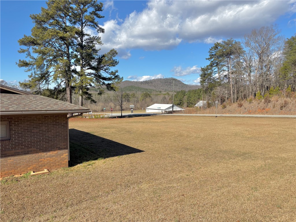 1404 Farrs Bridge Road Easley, SC 29640 - Photo 20 of 27 Expansive outdoor space offering a peaceful setting with distant mountain views.