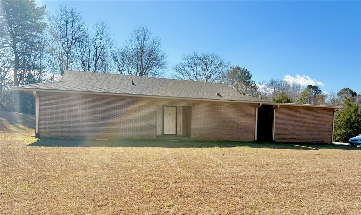 1404 Farrs Bridge Road Easley, SC 29640 - Photo 2 of 27 This classic brick residence offers a solid construction and a peaceful natural setting.