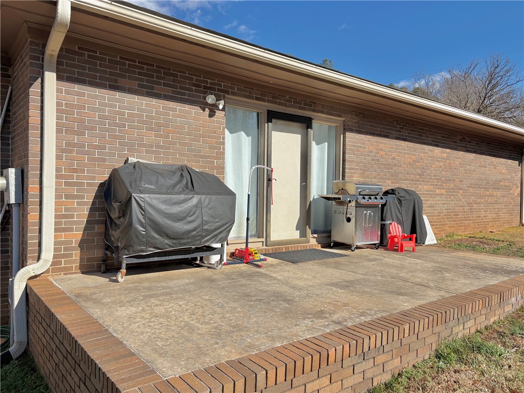 1404 Farrs Bridge Road Easley, SC 29640 - Photo 22 of 27 This spacious outdoor patio provides an ideal setting for gatherings and outdoor cooking.