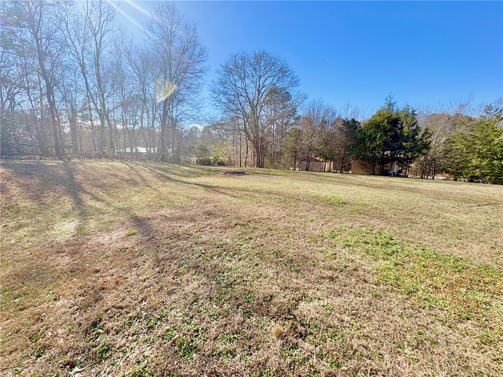 1404 Farrs Bridge Road Easley, SC 29640 - Photo 24 of 27 Expansive green space offers a serene outdoor environment for relaxation and recreation.