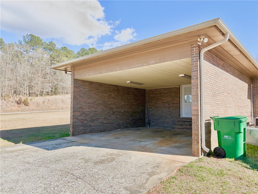 1404 Farrs Bridge Road Easley, SC 29640 - Photo 27 of 27 This property features a practical carport with easy access to the home's entrance.