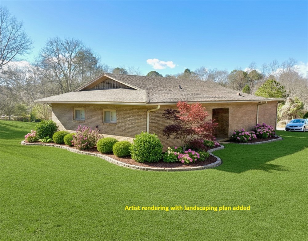 1404 Farrs Bridge Road Easley, SC 29640 - Photo 3 of 27 This residence features a meticulously landscaped yard, perfect for outdoor enjoyment.