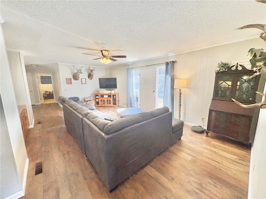 1404 Farrs Bridge Road Easley, SC 29640 - Photo 4 of 27 This living area offers a relaxed atmosphere, perfect for gatherings and everyday comfort.